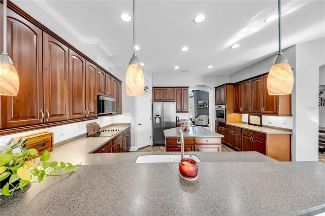 a bedroom with a bed and a bookshelf