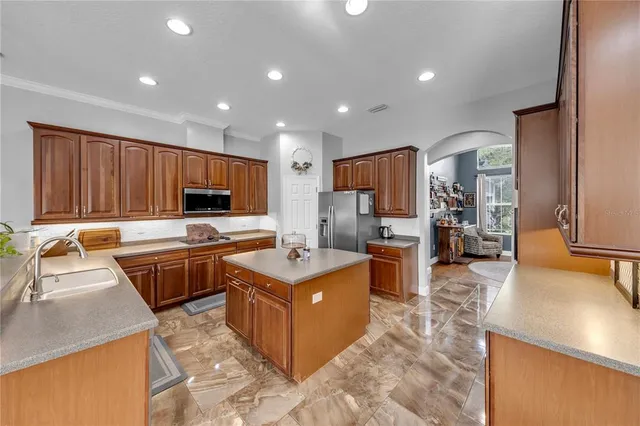 a bedroom with furniture and wooden floor