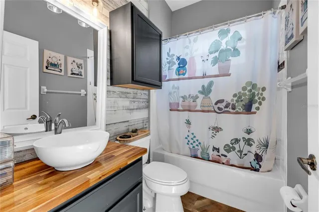 a view of a patio with a table and chairs