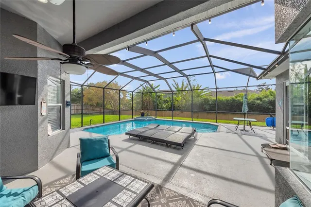 a lobby with furniture and floor to ceiling window
