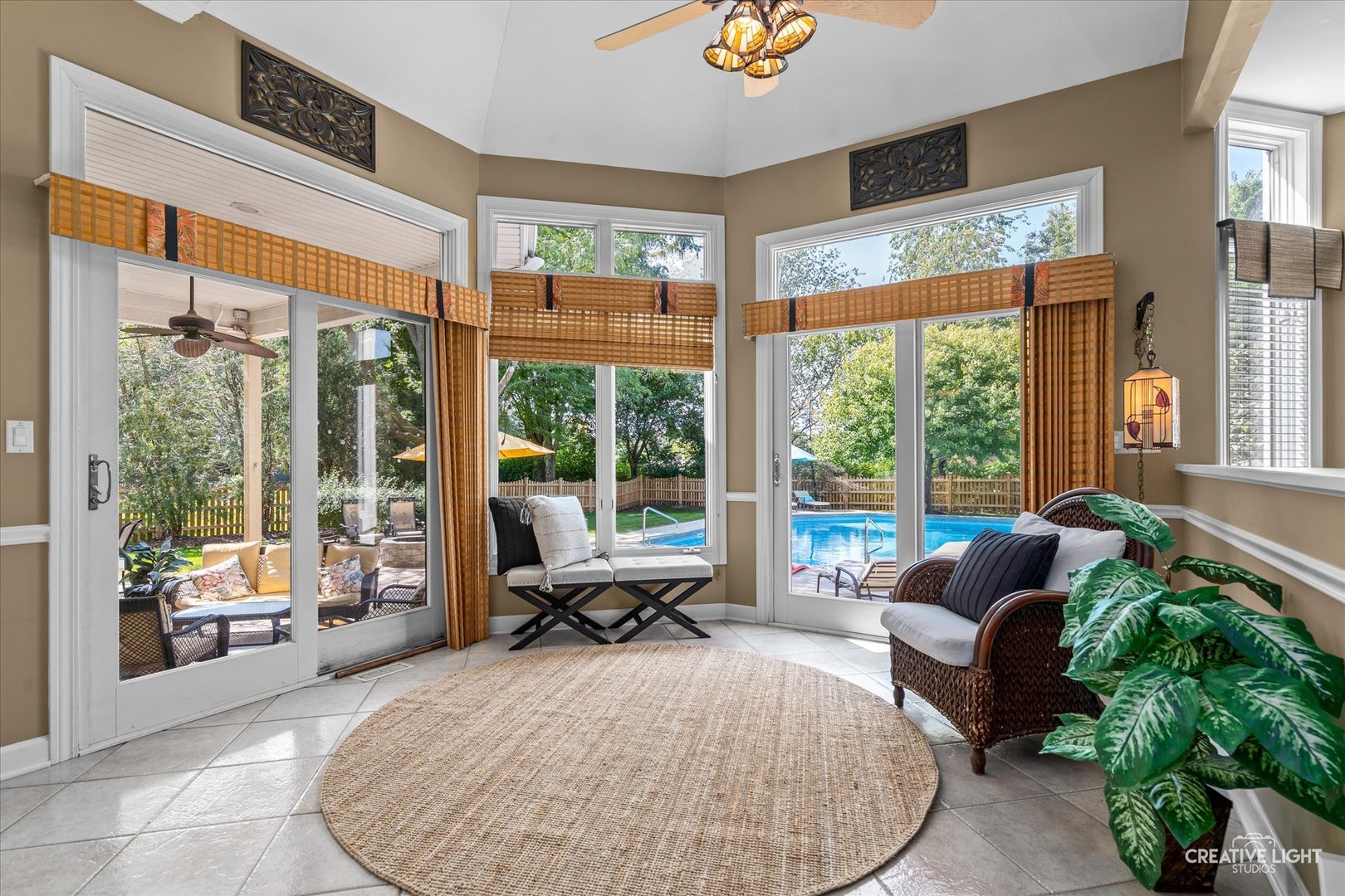 4811 Sebastian Court Naperville, IL 60564 - Photo 12 of 49 a living room with furniture and floor to ceiling windows