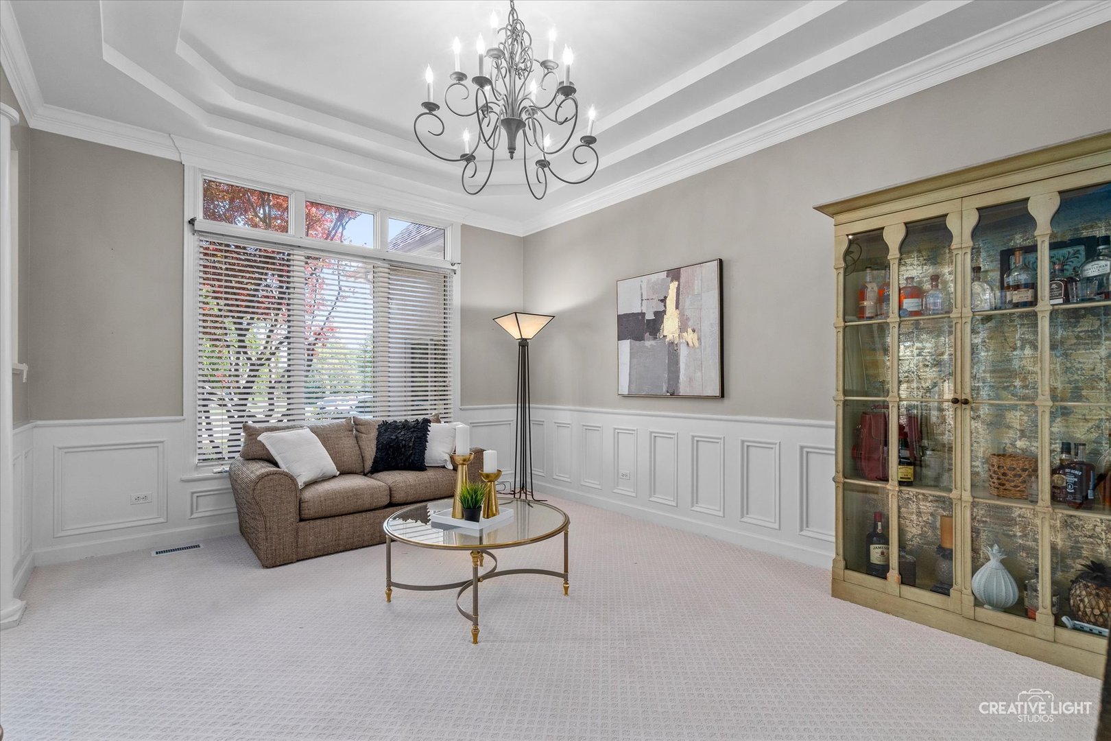 4811 Sebastian Court Naperville, IL 60564 - Photo 15 of 49 a living room with furniture and a chandelier