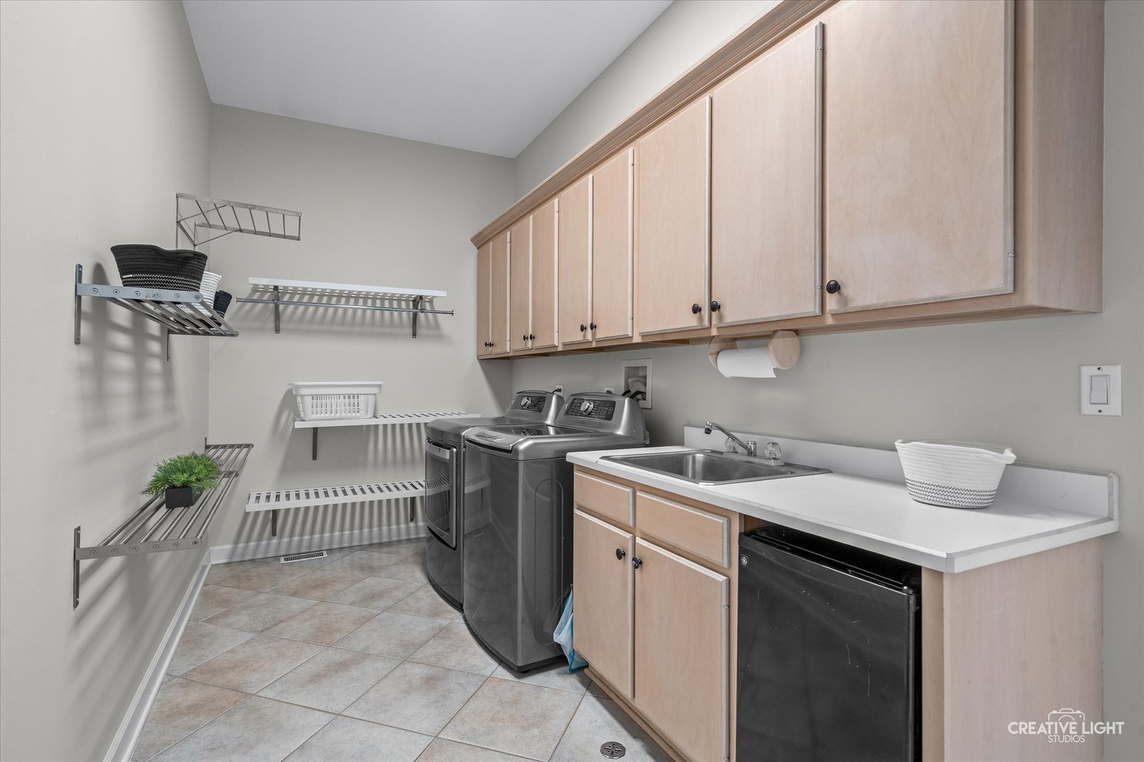 4811 Sebastian Court Naperville, IL 60564 - Photo 17 of 49 a kitchen with a sink and cabinets