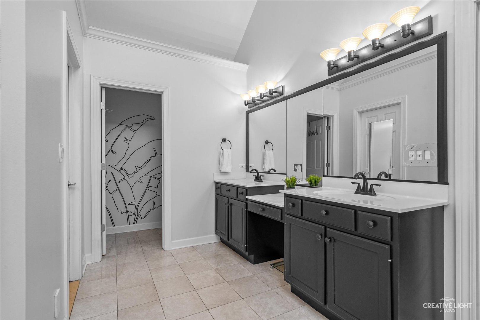 4811 Sebastian Court Naperville, IL 60564 - Photo 21 of 49 a kitchen with a sink and cabinets