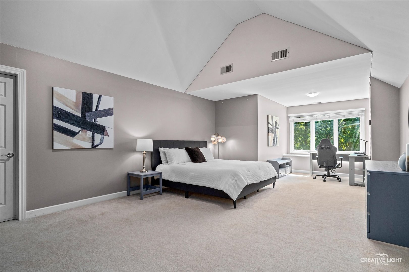 4811 Sebastian Court Naperville, IL 60564 - Photo 22 of 49 a spacious bedroom with a bed and glass window