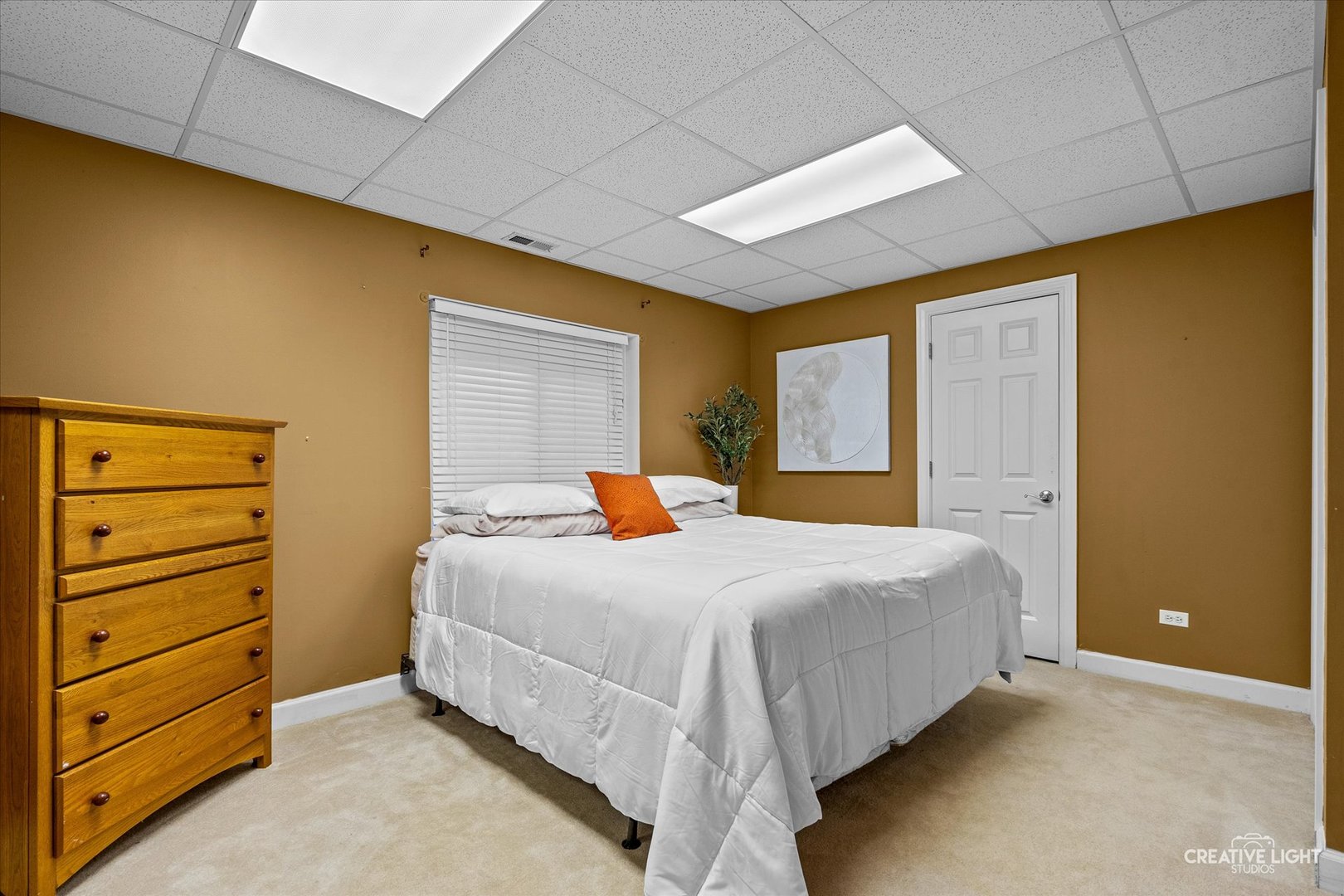 4811 Sebastian Court Naperville, IL 60564 - Photo 28 of 49 a bedroom with a bed and a dresser