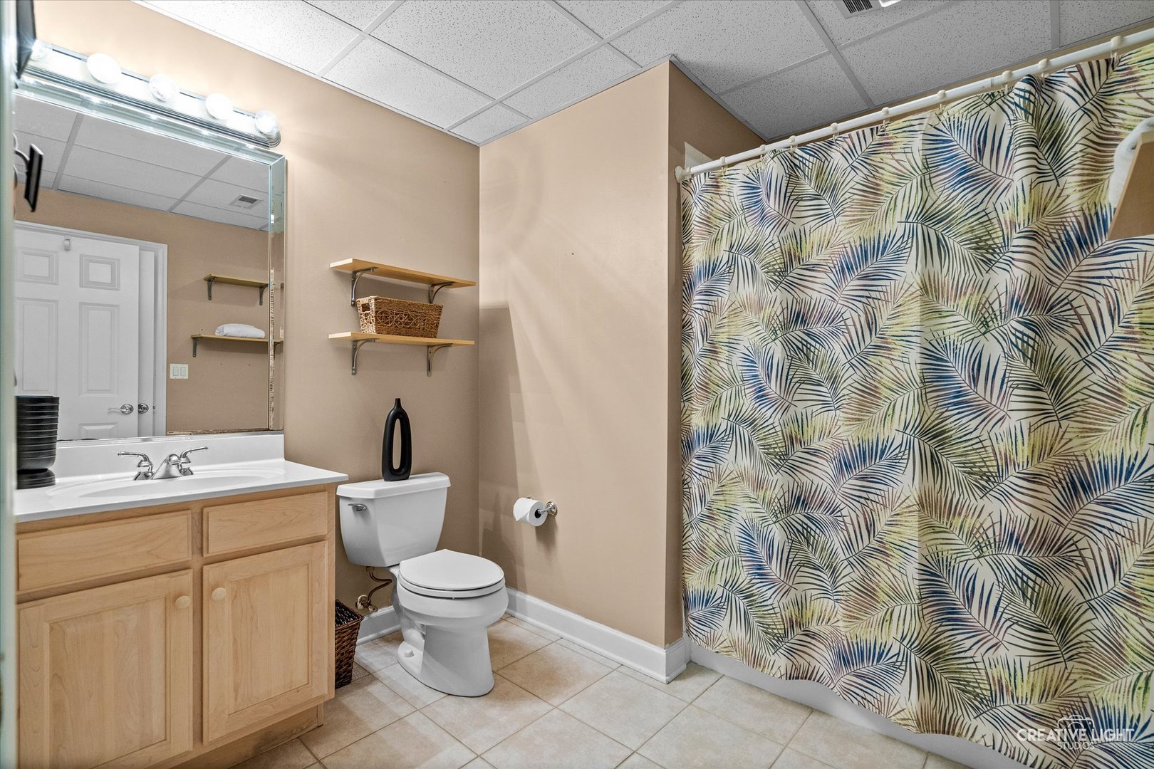 4811 Sebastian Court Naperville, IL 60564 - Photo 29 of 49 a bathroom with a toilet a sink and a shower