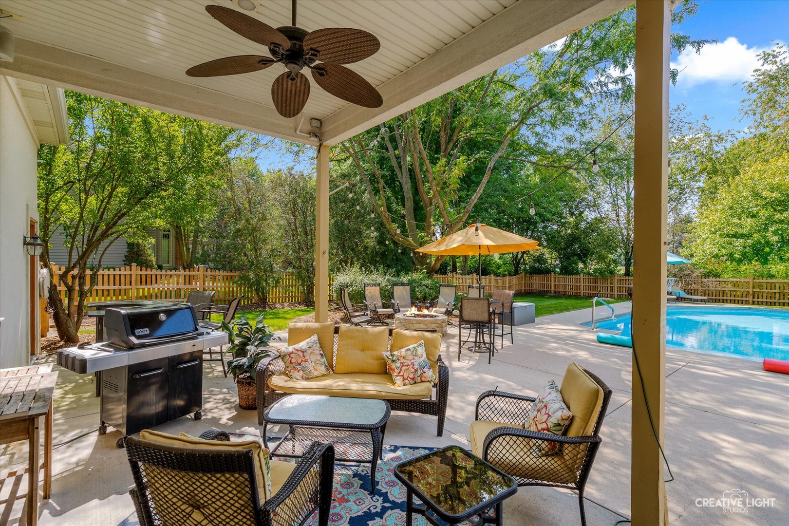 4811 Sebastian Court Naperville, IL 60564 - Photo 30 of 49 a outdoor space with patio the couches and a fireplace