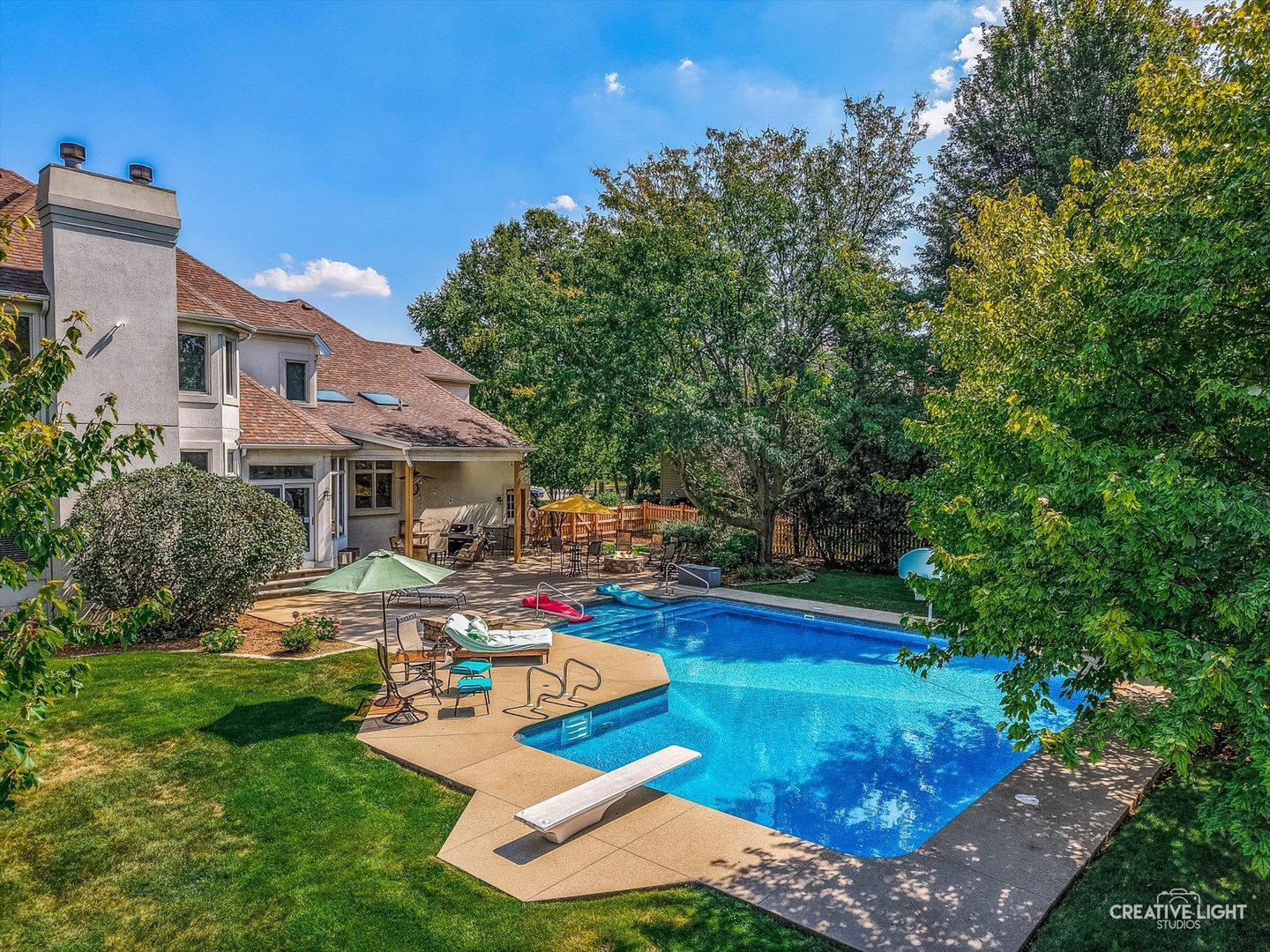 4811 Sebastian Court Naperville, IL 60564 - Photo 39 of 49 a view of a house with swimming pool and sitting area