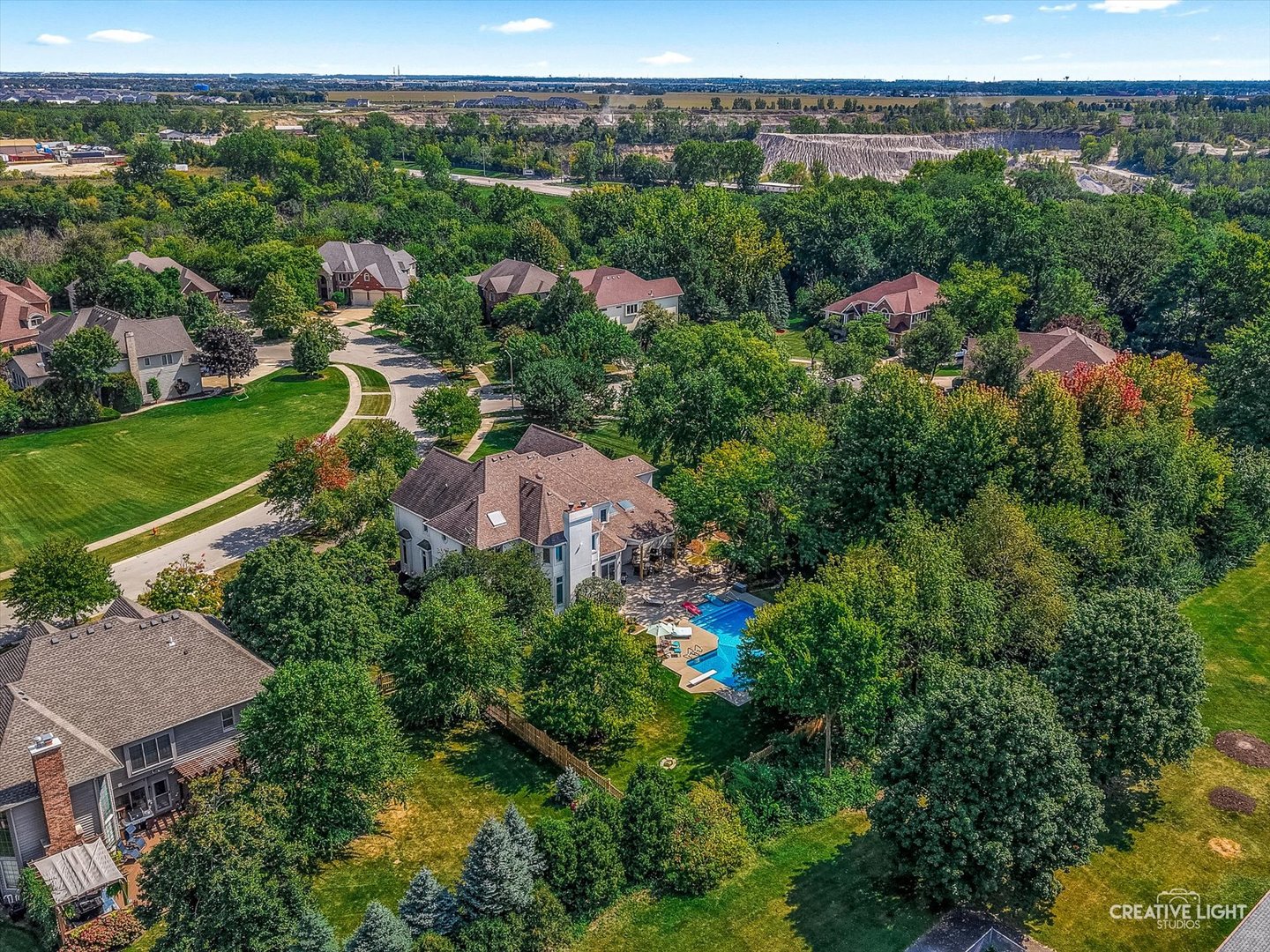 4811 Sebastian Court Naperville, IL 60564 - Photo 41 of 49 an aerial view of a house with lots of trees