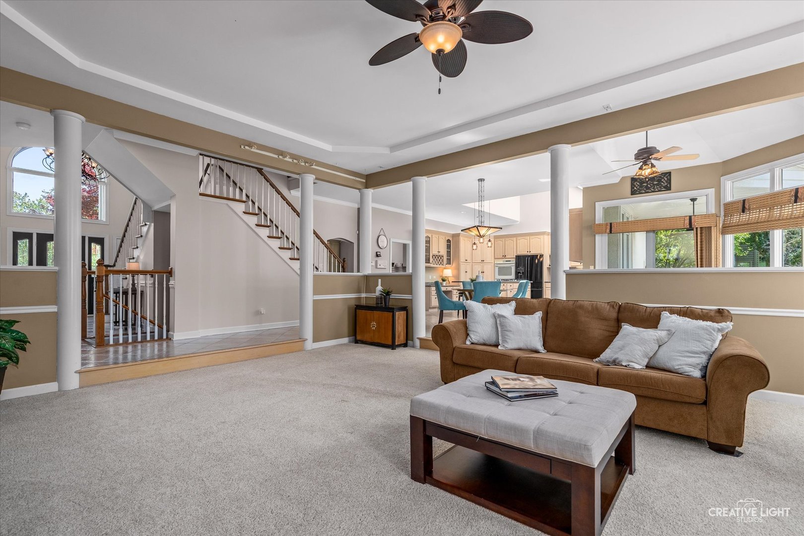 4811 Sebastian Court Naperville, IL 60564 - Photo 8 of 49 a living room with furniture and a fireplace