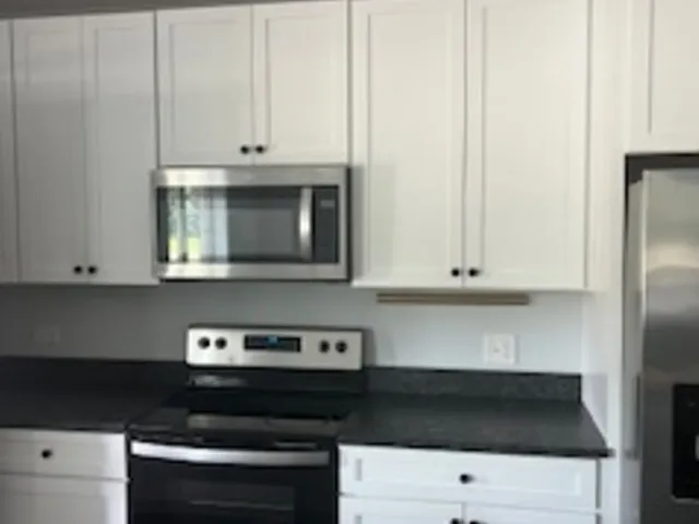 a view of a hallway with windows