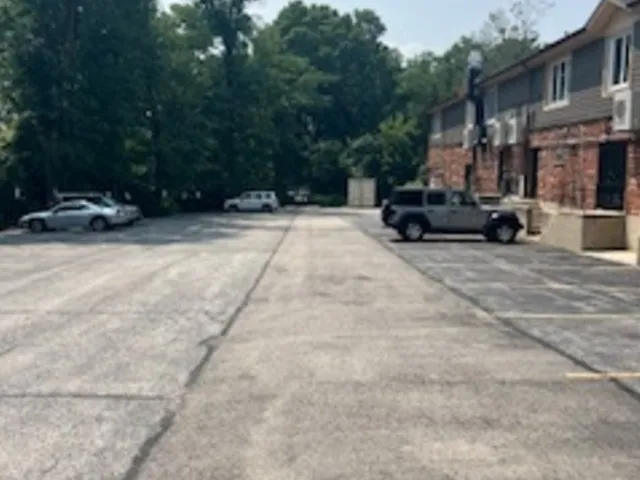 a view of car parked in front of building