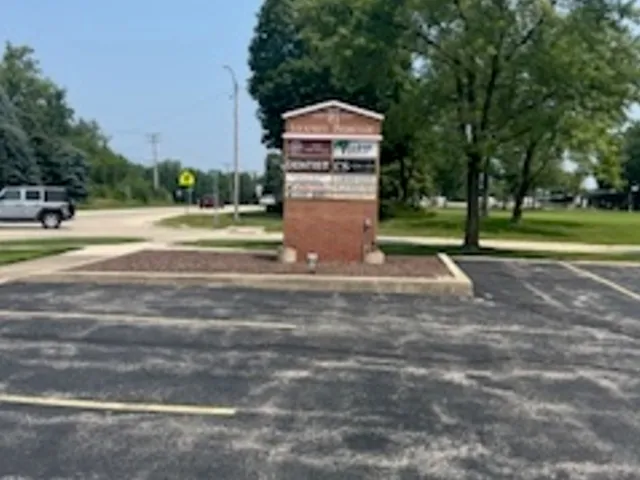 a view of a yard in front of a house