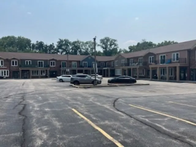 a car parked in front of a house