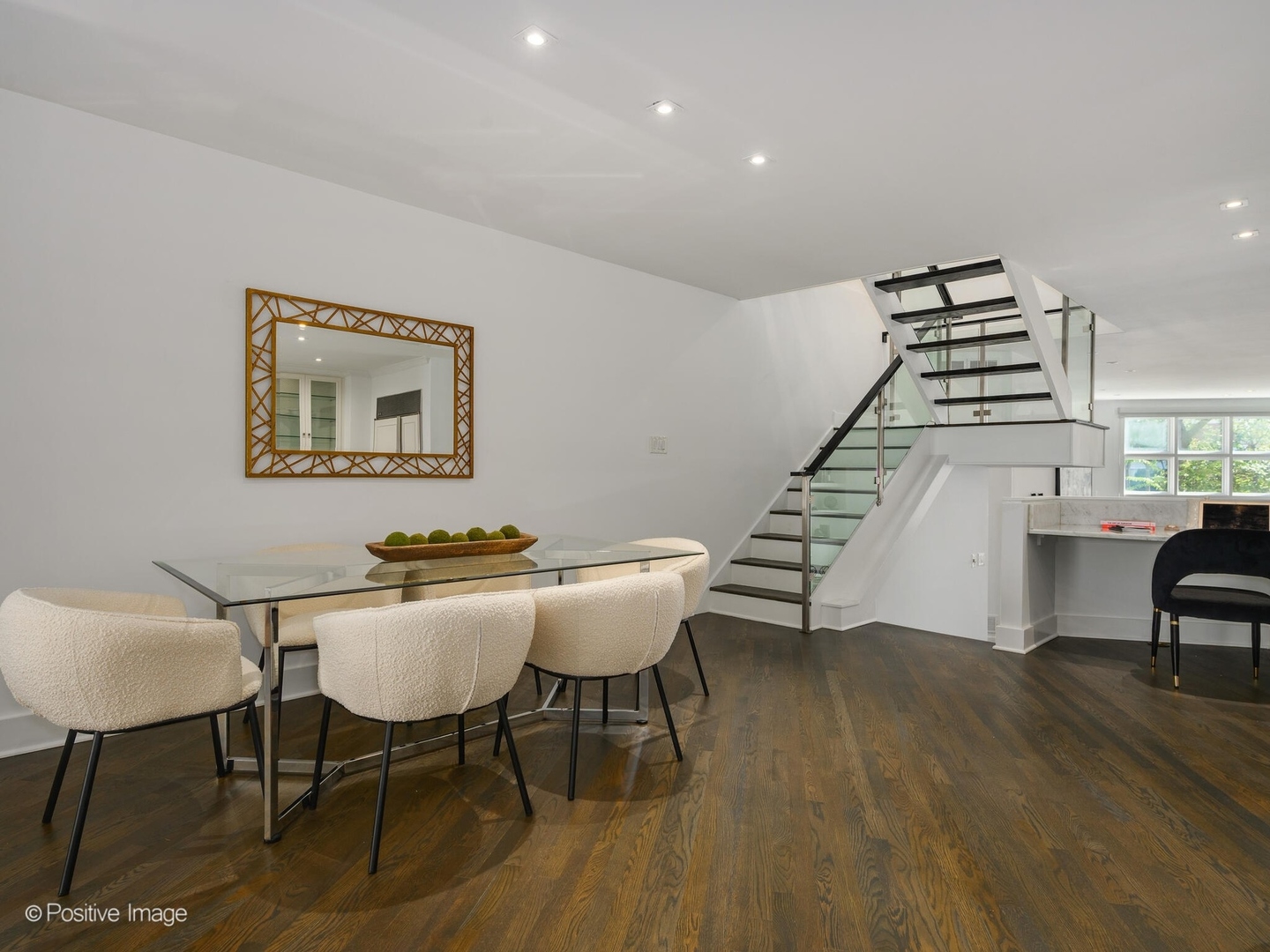 2034 North Burling Street Chicago, IL 60614 - Photo 14 of 32 a view of a dining room with furniture and wooden floor