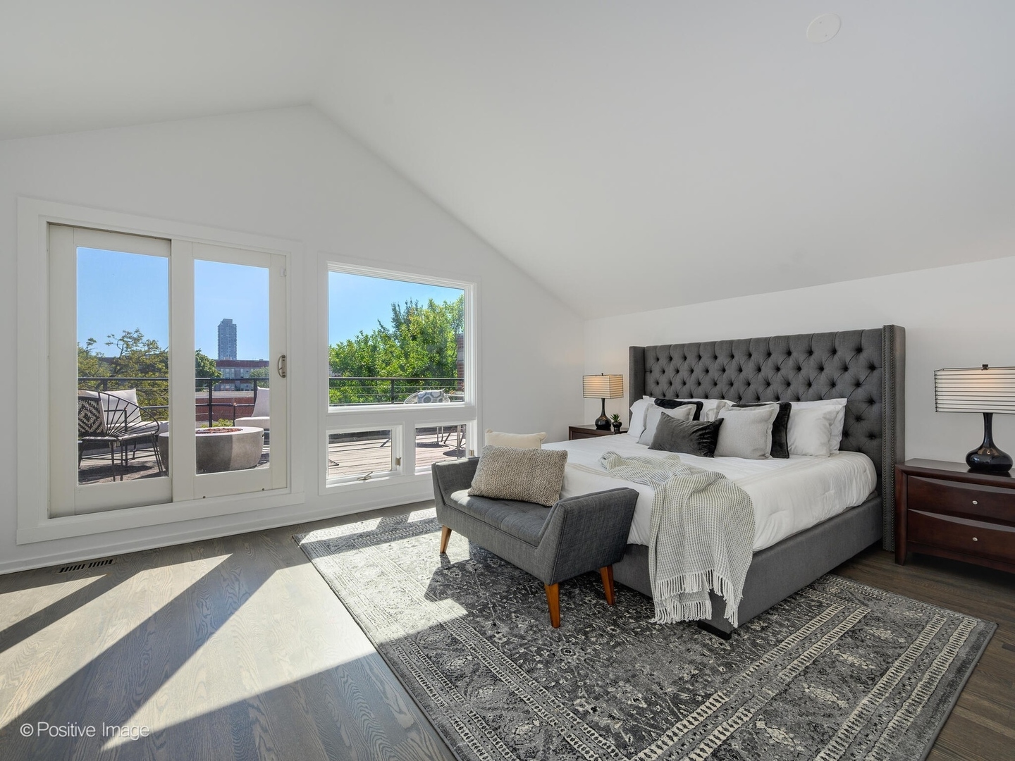 2034 North Burling Street Chicago, IL 60614 - Photo 26 of 32 a bedroom with a large bed and a window