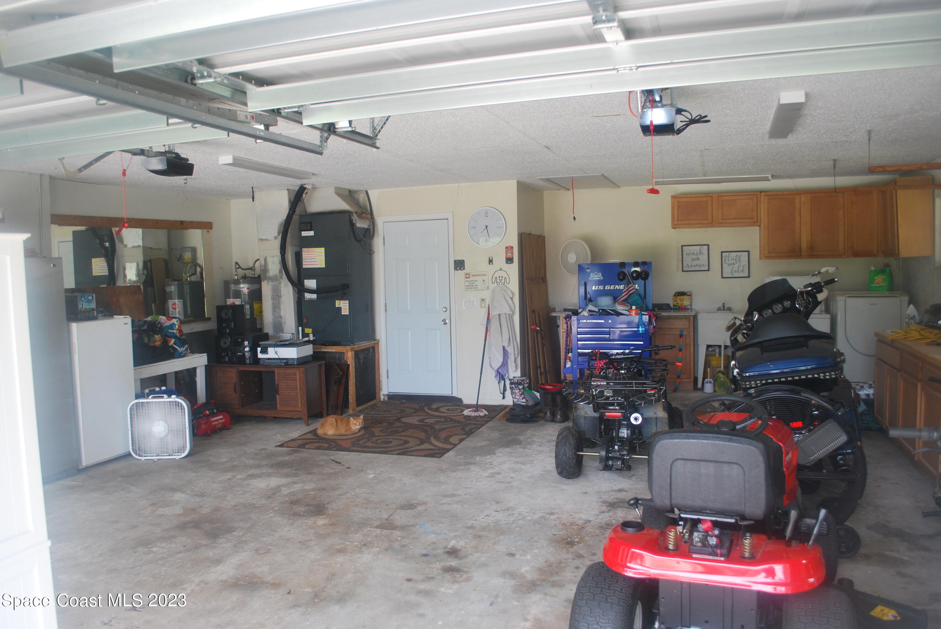 2745 Corey Road Malabar, FL 32950 - Photo 17 of 39 a view of a room with gym equipment