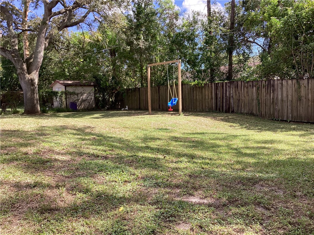 8001 Roberts Road Fort Pierce, FL 34951 - Photo 4 of 29 a view of a house with backyard and tree