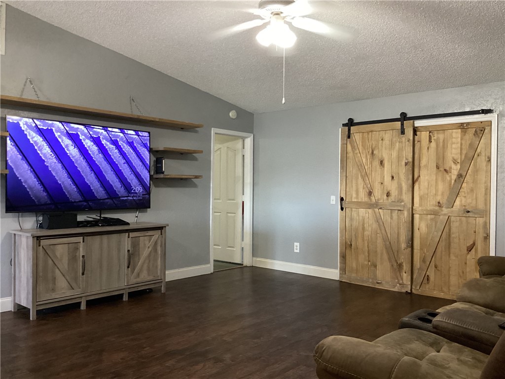 8001 Roberts Road Fort Pierce, FL 34951 - Photo 8 of 29 a view of room with furniture and a chandelier