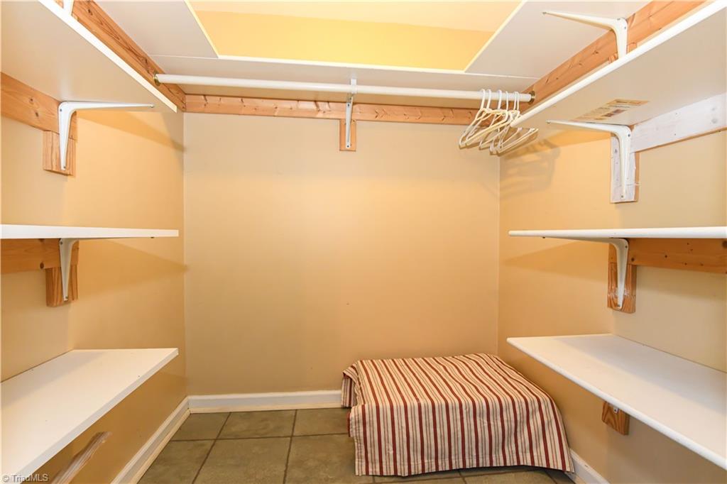 5735 Bramblegate Road, Unit E Greensboro, NC 27409 - Photo 13 of 25 Main level half bath