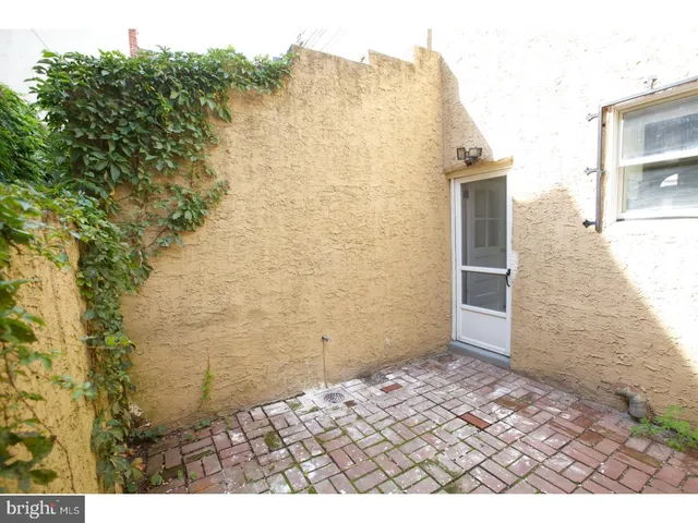 a view of a pathway both side of building