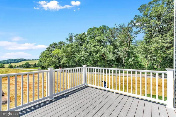 a view of a wooden roof deck
