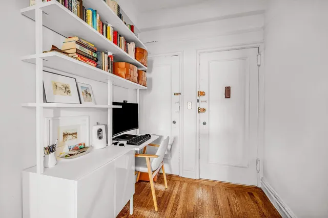 a kitchen with a stove and a refrigerator
