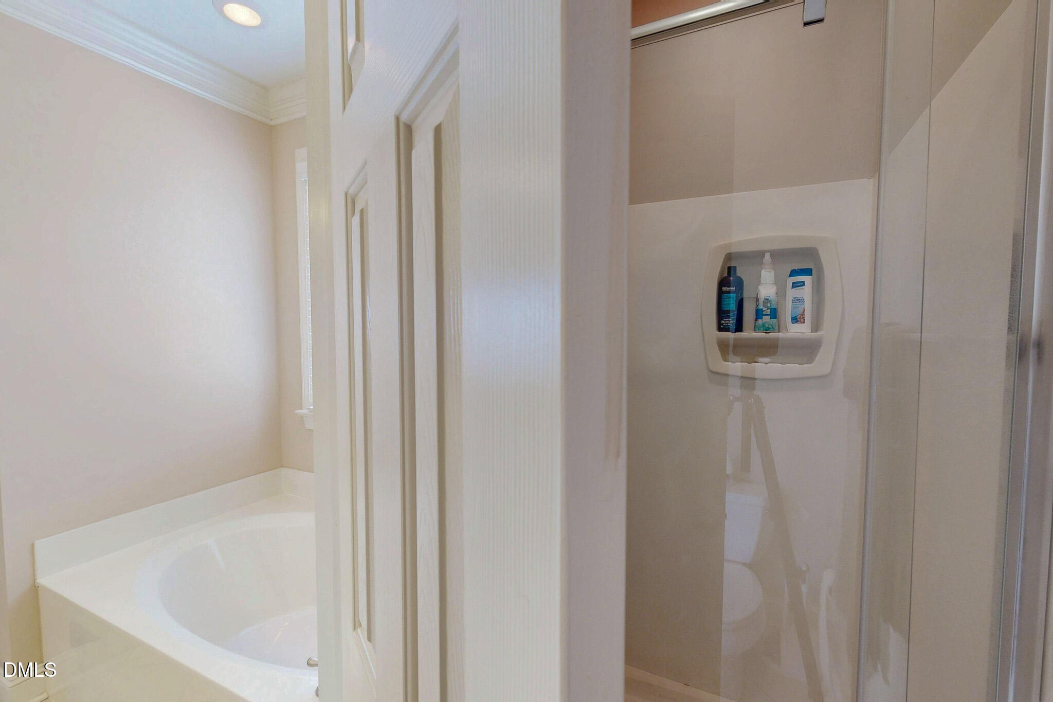 115 Duncan Plantation Road Timberlake, NC 27583 - Photo 17 of 48 a bathroom with bathtub and shower