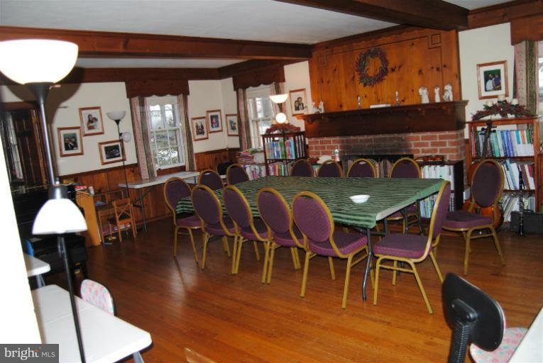 600 Union Bridge Road Union Bridge, MD 21791 - Photo 10 of 17 a dining room with furniture a chandelier and wooden floor