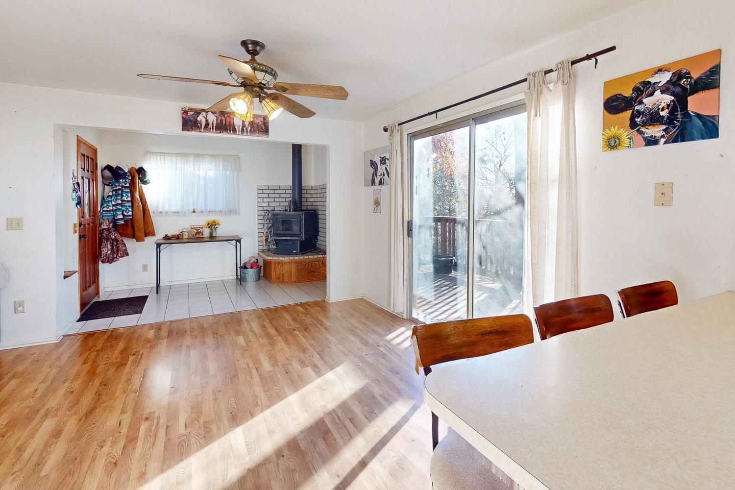 10095 Frenchtown Dobbins Road Dobbins, CA 95935 - Photo 13 of 46 a bedroom with wooden floor and large windows