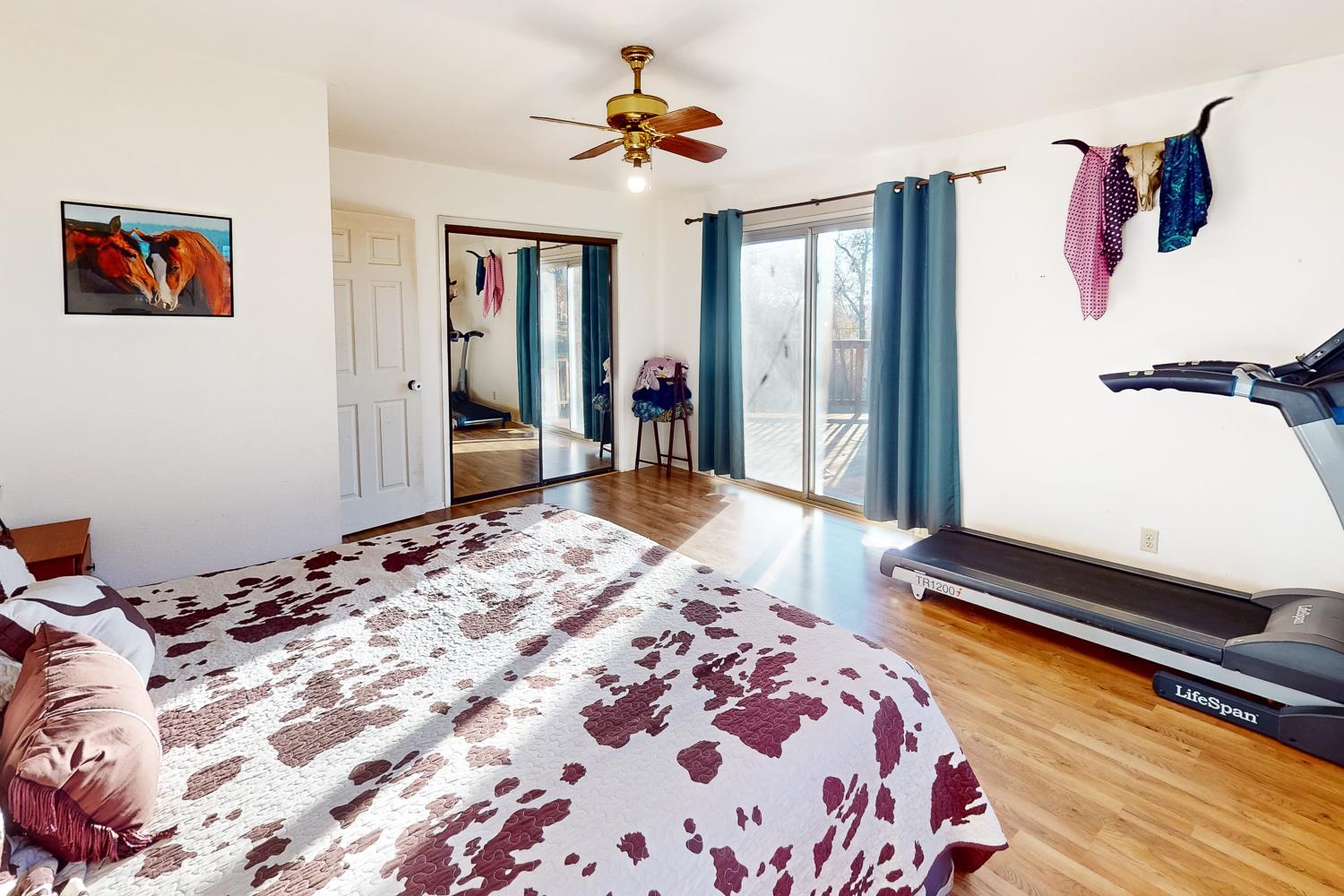 10095 Frenchtown Dobbins Road Dobbins, CA 95935 - Photo 16 of 46 a bedroom with a bed and a large mirror on the dresser