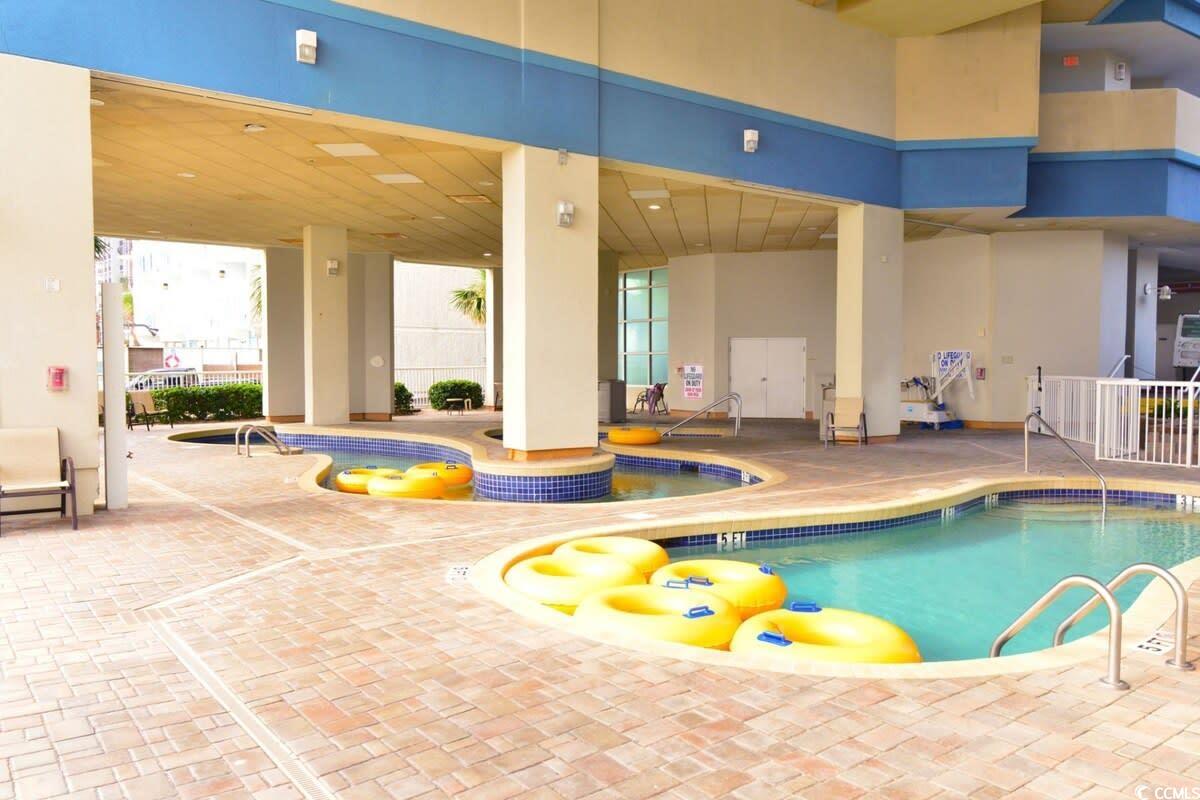 2504 North Ocean Boulevard, Unit 1835 Myrtle Beach, SC 29577 - Photo 21 of 25 Indoor community pool with a patio
