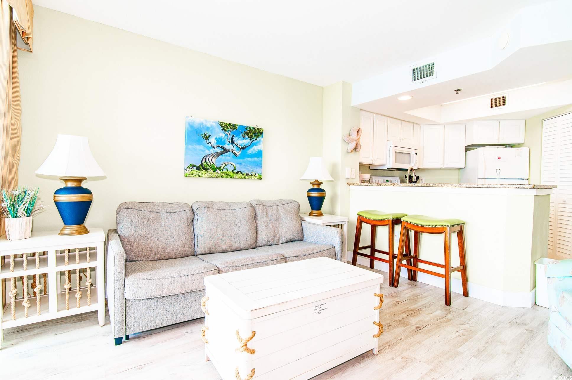 2504 North Ocean Boulevard, Unit 1835 Myrtle Beach, SC 29577 - Photo 3 of 25 Living area featuring light wood finished floors and recessed lighting