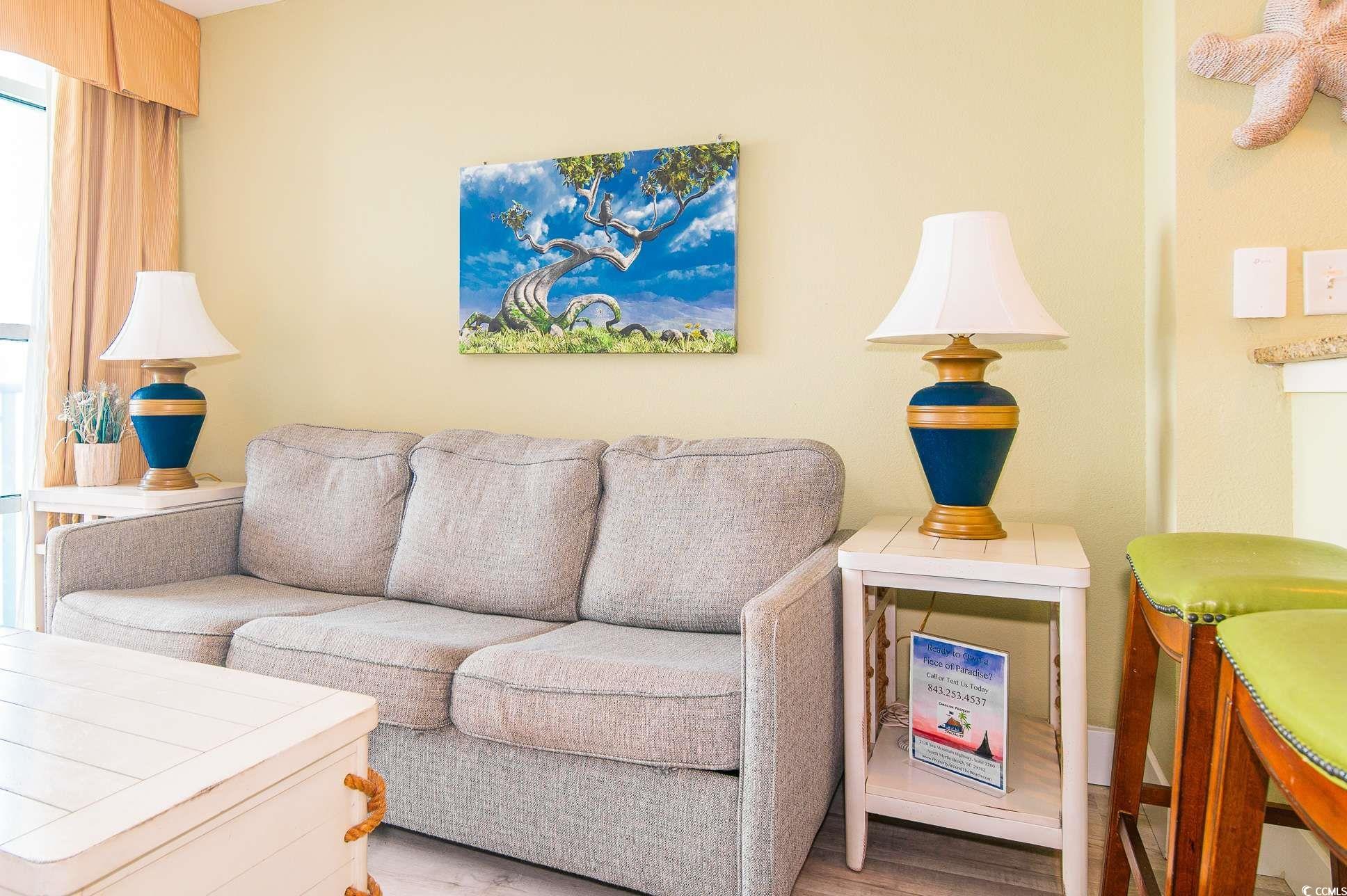2504 North Ocean Boulevard, Unit 1835 Myrtle Beach, SC 29577 - Photo 7 of 25 Living area featuring wood finished floors