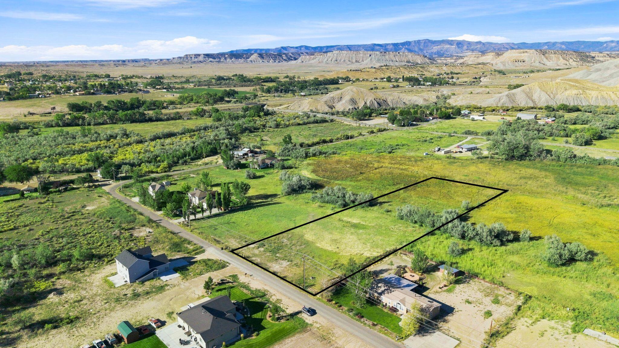 1250 West N Helper, UT 84526 - Photo 2 of 21 mls_DJI_20260909082654_0181_D lot line 1