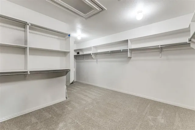 a view of an empty walk in closet
