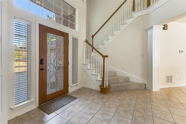 a view of entryway with a front door