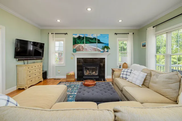 a en suite bathroom with a granite countertop tub and a sink