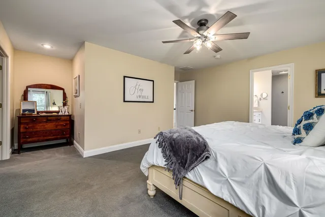 an aerial view of residential house with outdoor space and swimming pool