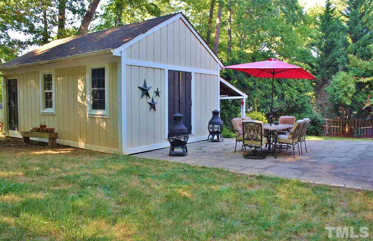 4004 Grimstead Lane Raleigh, NC 27613 - Photo 22 of 25 a view of a house with backyard and sitting area
