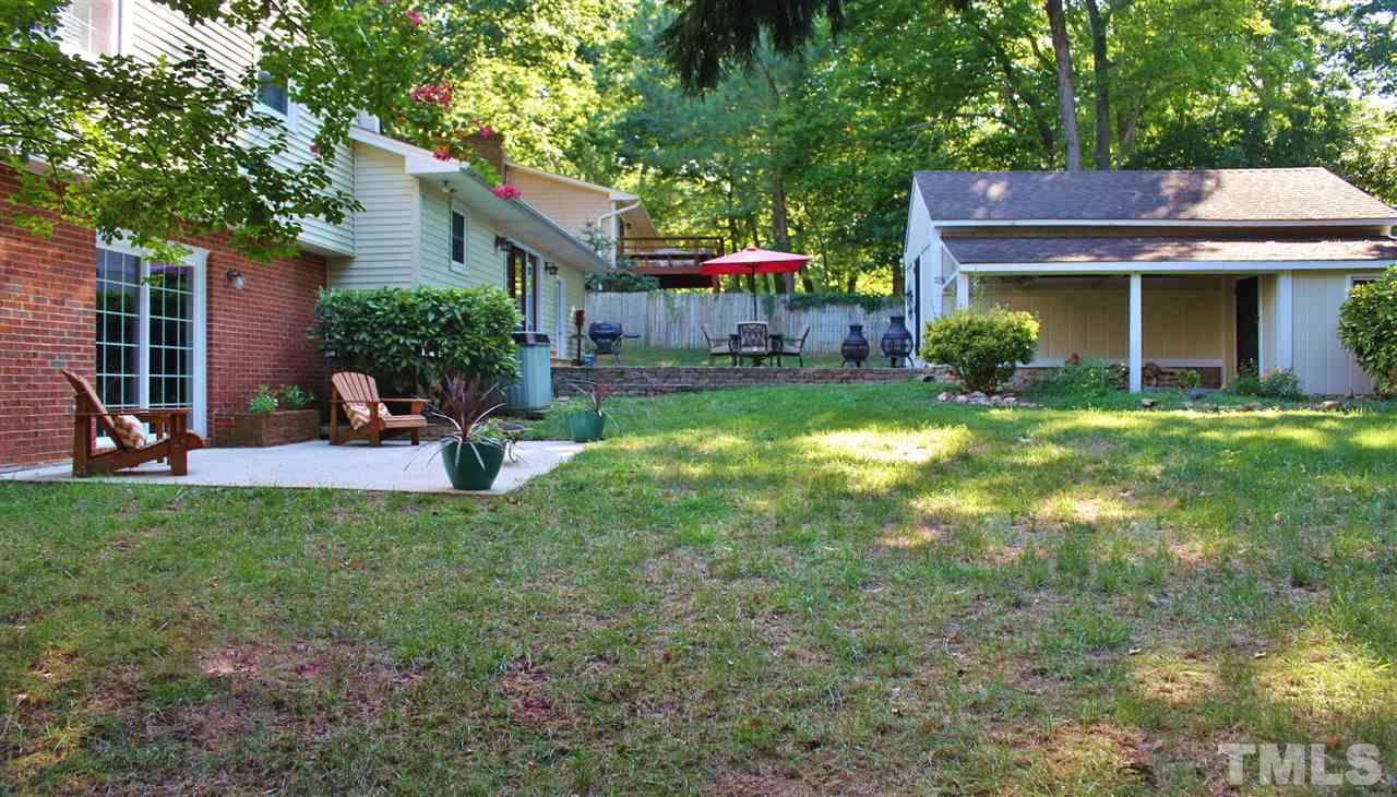 4004 Grimstead Lane Raleigh, NC 27613 - Photo 24 of 25 a view of house with a yard