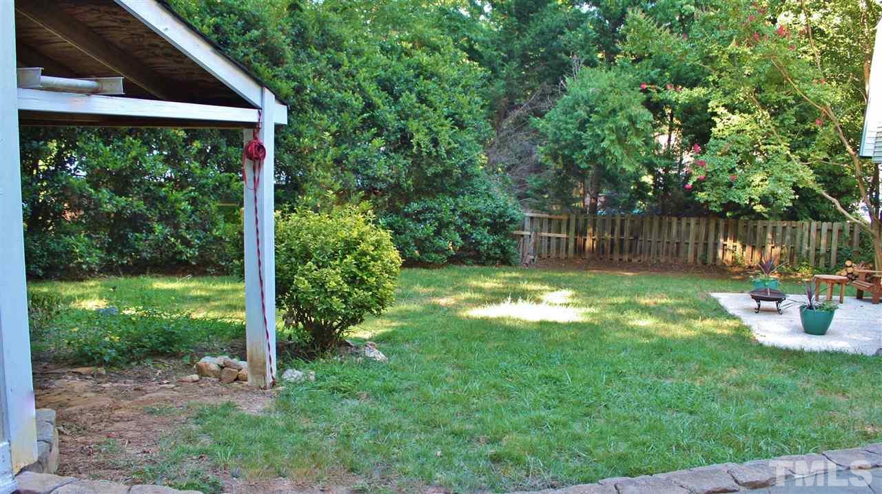 4004 Grimstead Lane Raleigh, NC 27613 - Photo 25 of 25 a backyard of a house with seating space