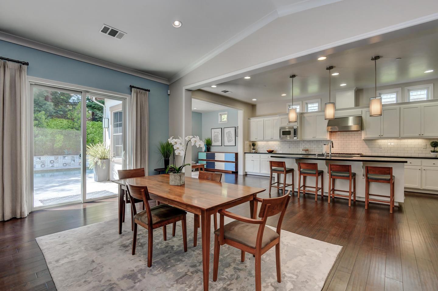 181 Mansfield Drive Mountain View, CA 94040 - Photo 11 of 44 a dining room with furniture and wooden floor
