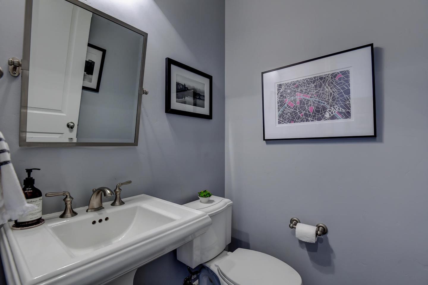 181 Mansfield Drive Mountain View, CA 94040 - Photo 18 of 44 a bathroom with a toilet a sink and mirror