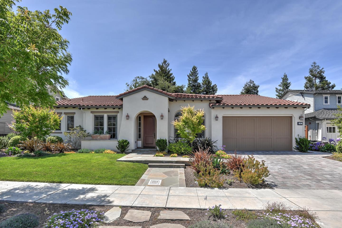 181 Mansfield Drive Mountain View, CA 94040 - Photo 2 of 44 a front view of a house with a yard and garage