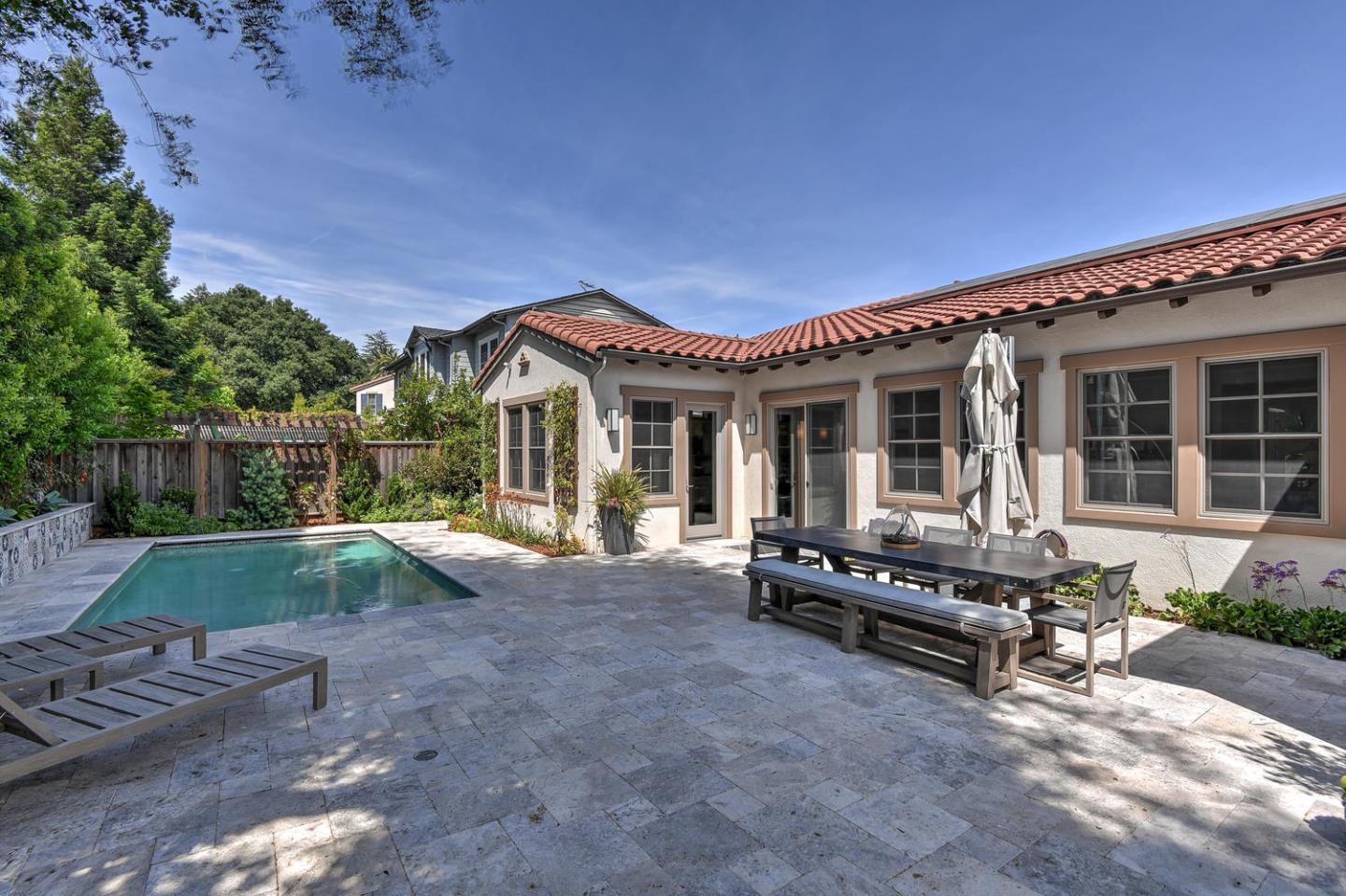 181 Mansfield Drive Mountain View, CA 94040 - Photo 34 of 44 a view of a house with backyard sitting area and garden