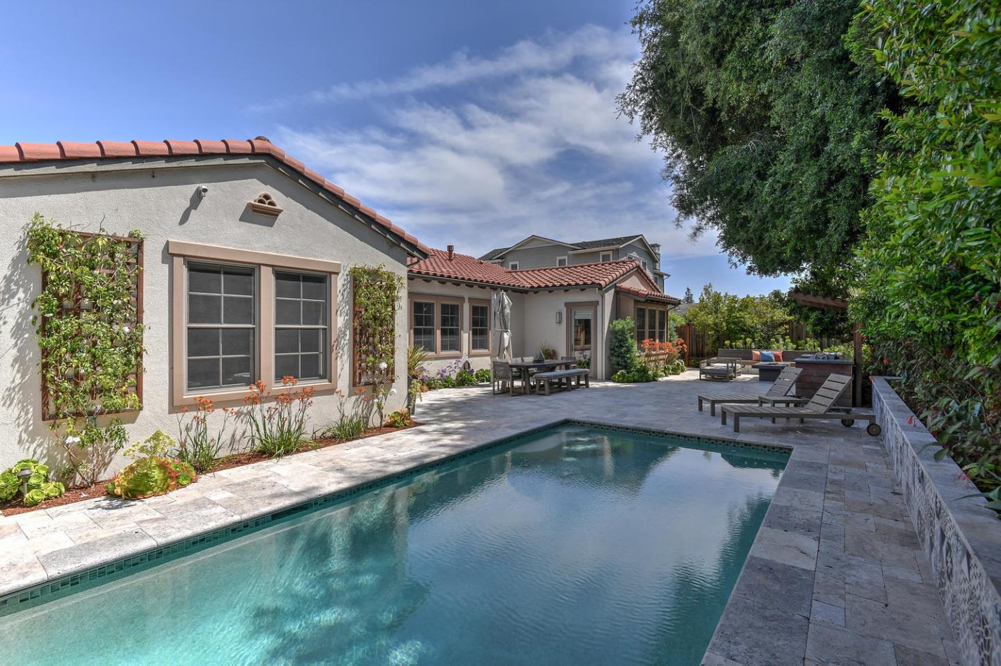 181 Mansfield Drive Mountain View, CA 94040 - Photo 37 of 44 a house view with swimming pool and sitting space