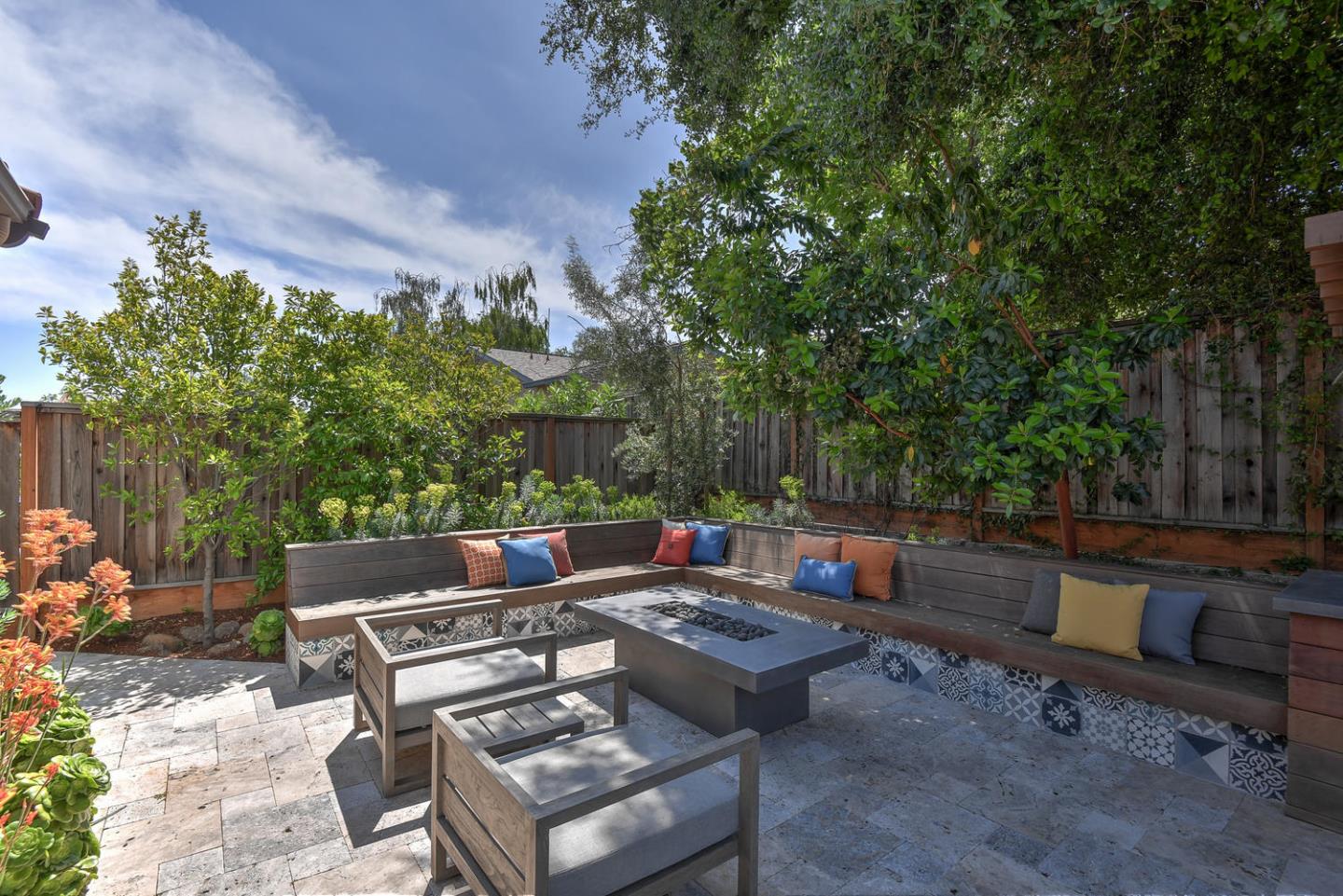 181 Mansfield Drive Mountain View, CA 94040 - Photo 39 of 44 a backyard of a house with fire pit and outdoor seating
