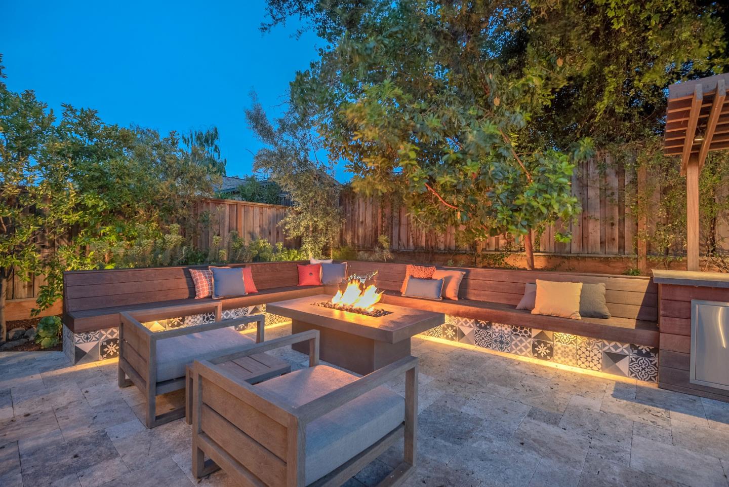 181 Mansfield Drive Mountain View, CA 94040 - Photo 40 of 44 a outdoor sitting area with a couch and wooden fence